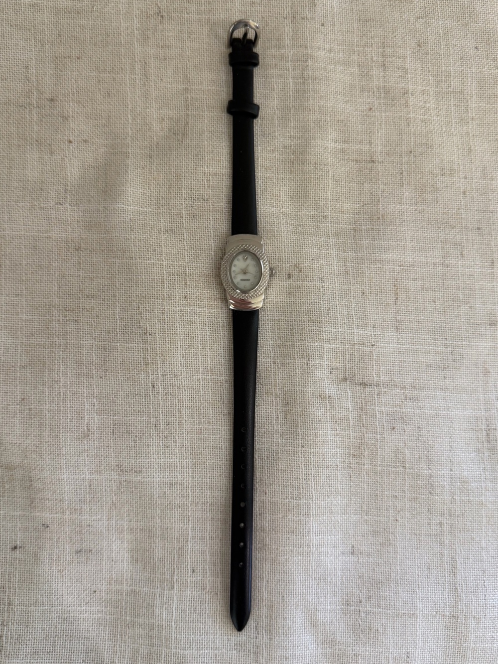 Diamond Accent Slim Black Leather Strap Watch with Silver Oval Face